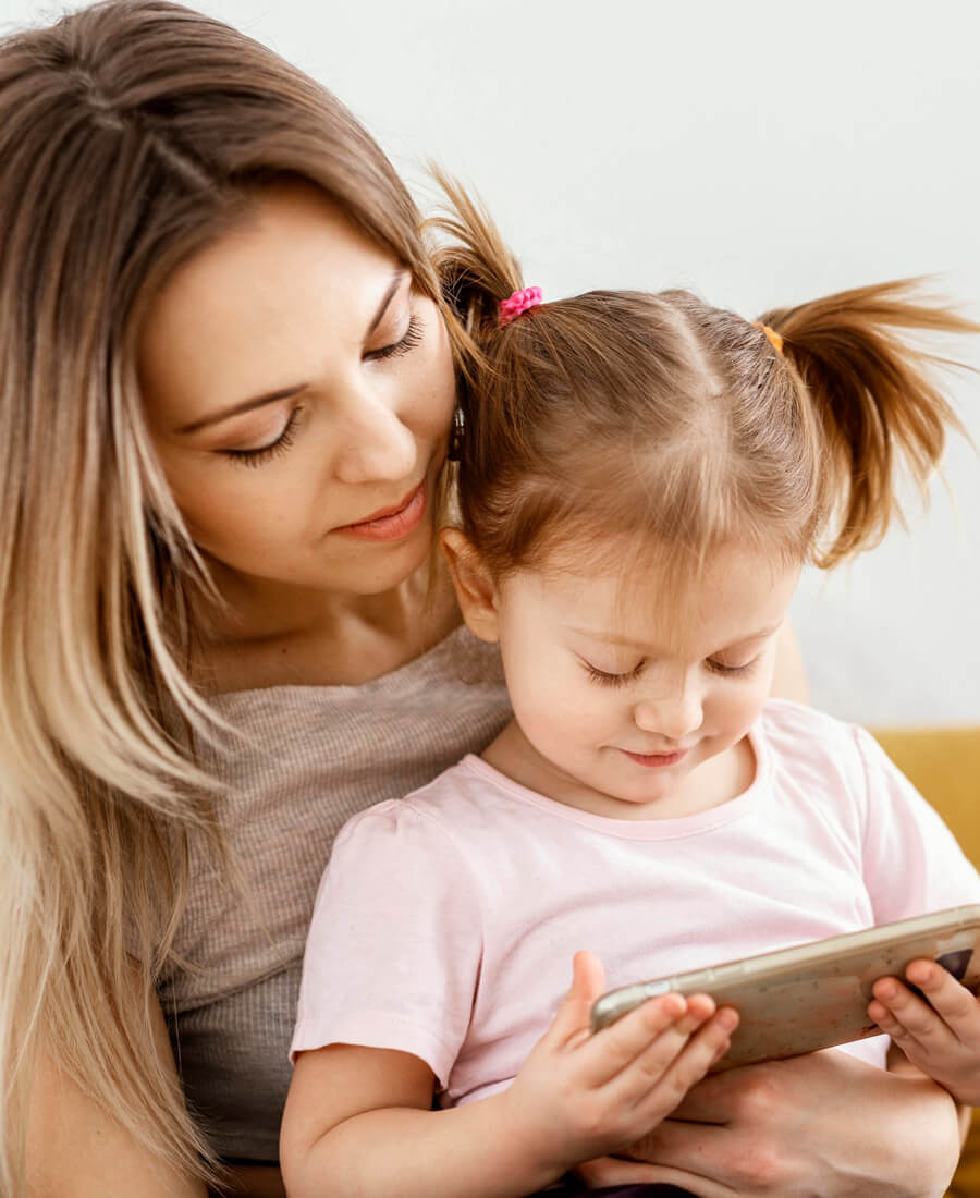 Child using a learning app on a tablet